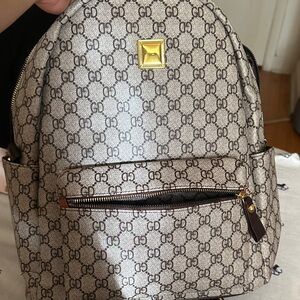 Monogram Pattern Backpack with Gold Accent